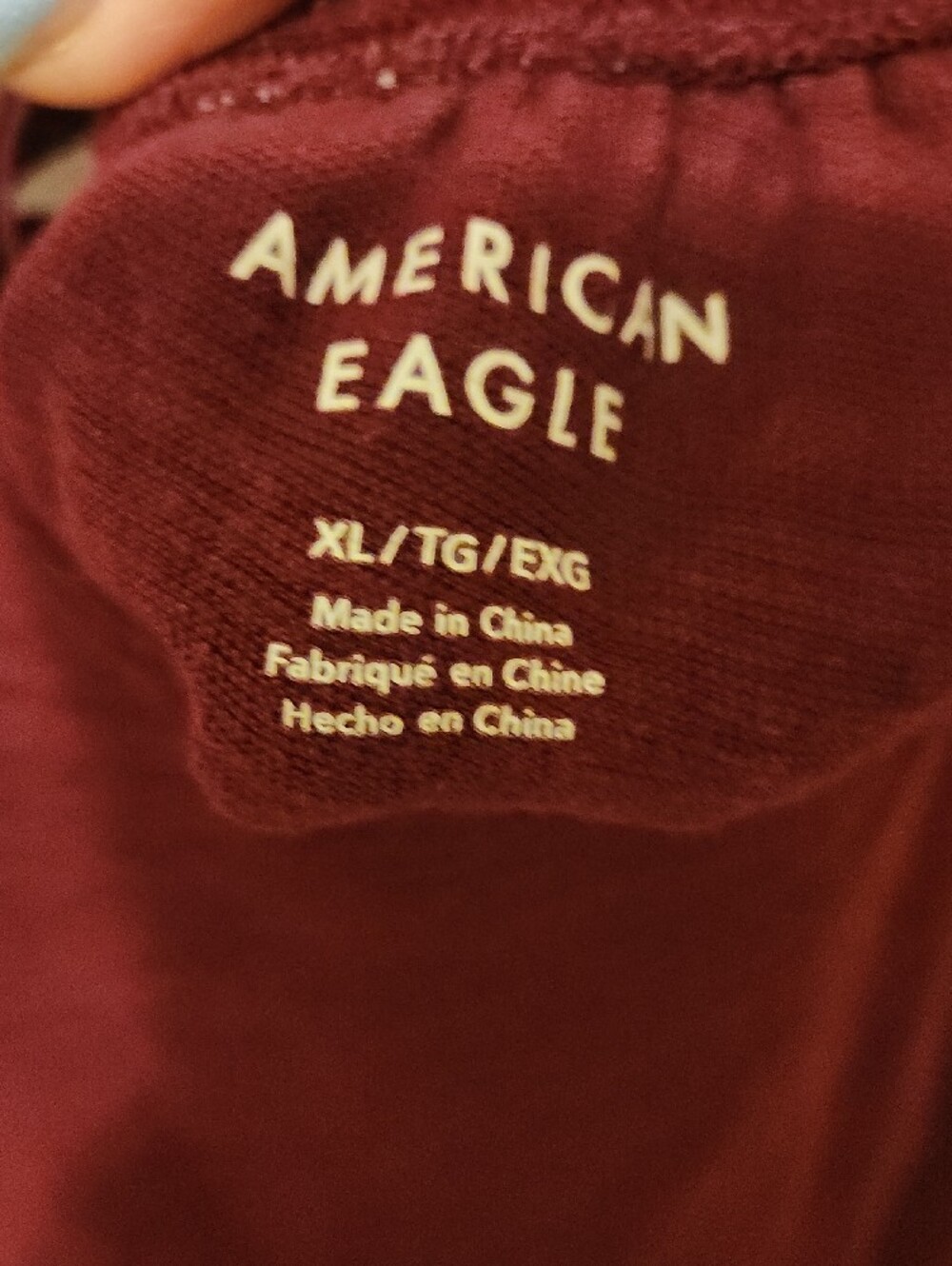American Eagle Outfitters Burgundy Short Sleeve Peplum Tunic - Picture 2 of 2